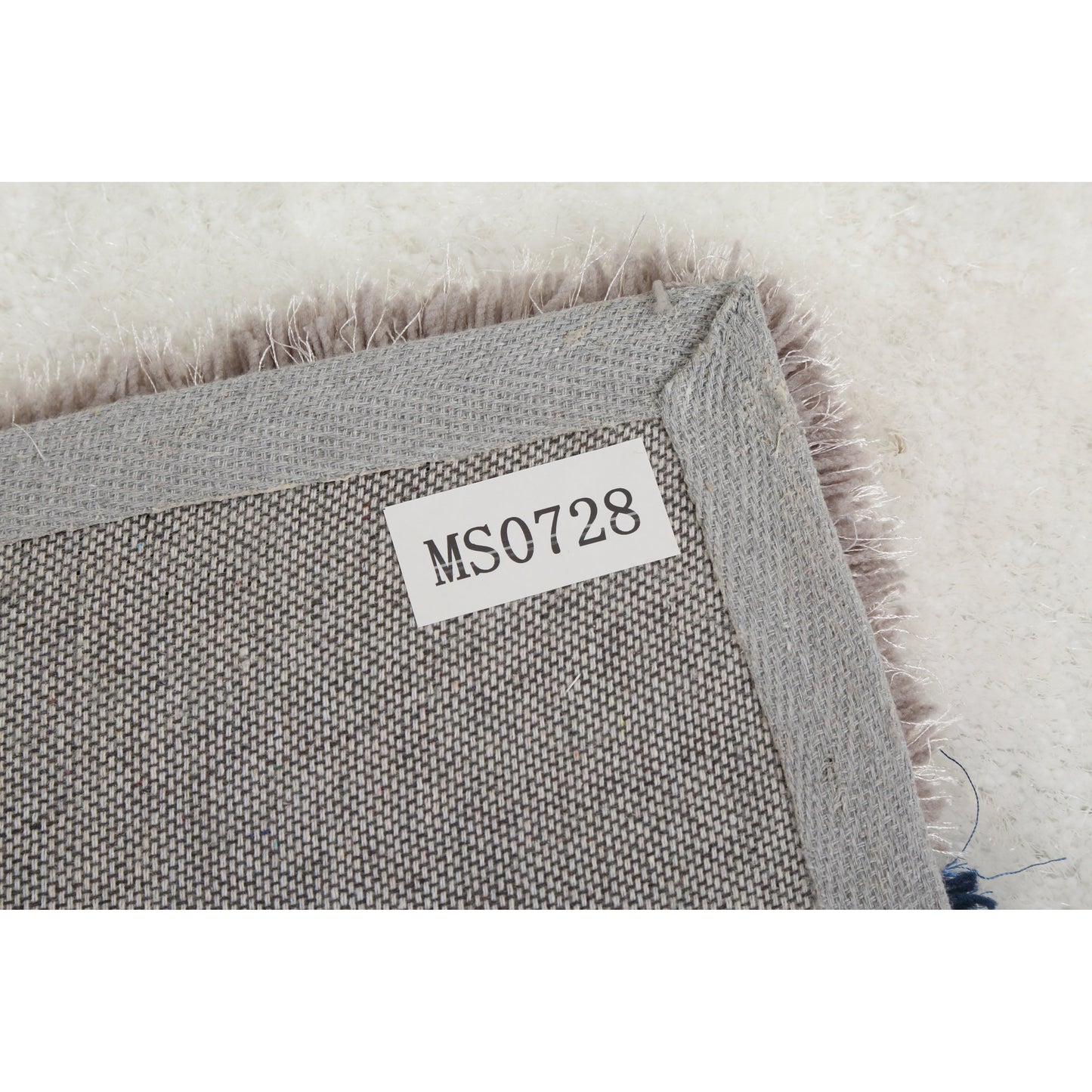 Tapis à poils longs Mateos au design abstrait