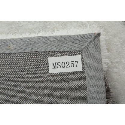 Tapis à poils longs Mateos au design abstrait