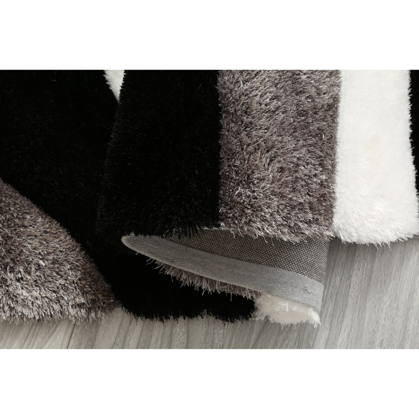 Tapis à poils longs Mateos au design abstrait