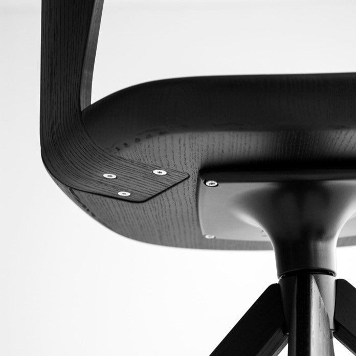 Chaise pivotante rembourrée Arco