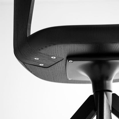 Chaise pivotante rembourrée Arco